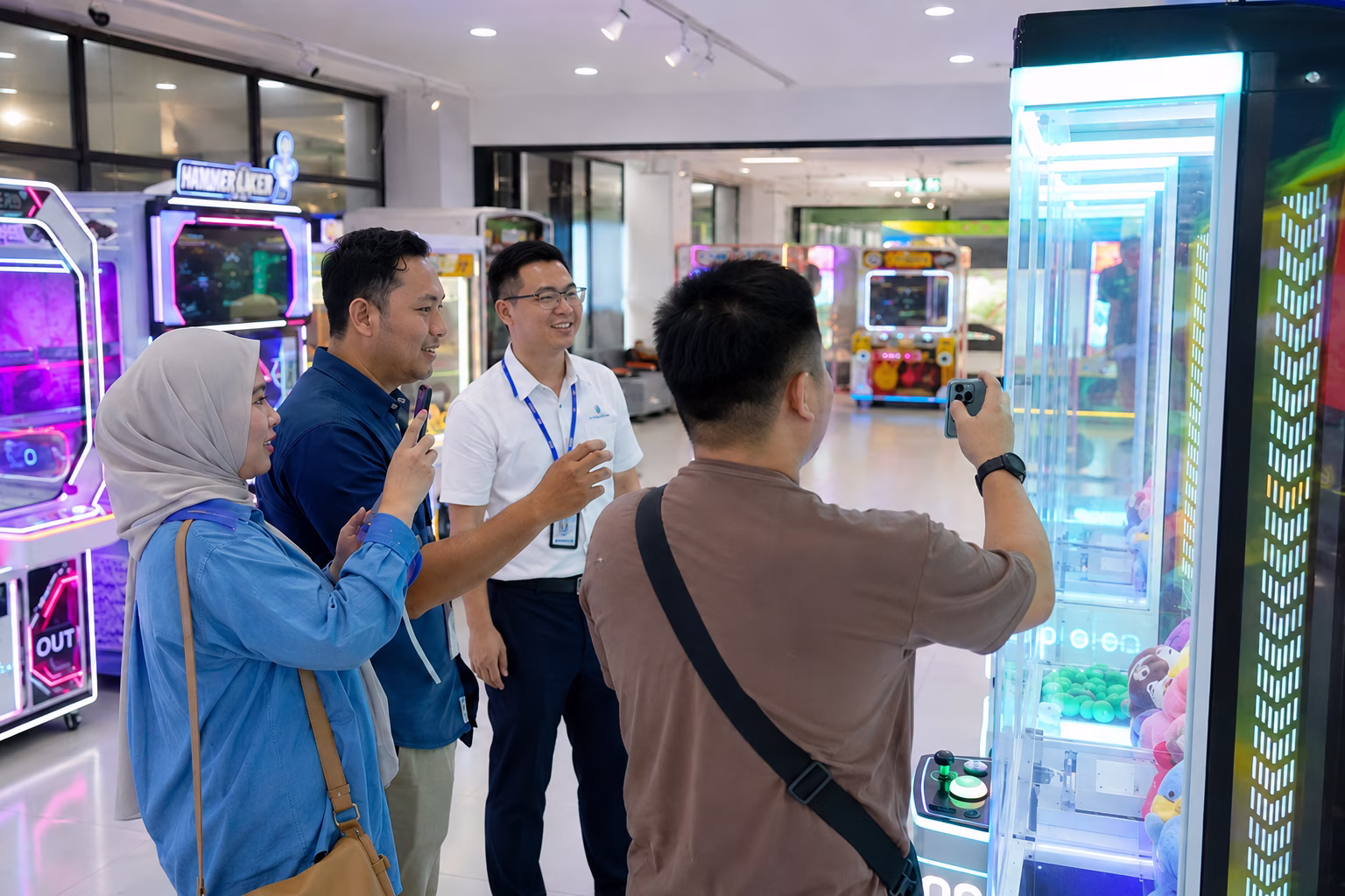 Malaysia buyers testing a claw machine